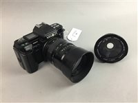 Lot 84 - A MINOLTA SLR CAMERA WITH LENSE AND FLASH