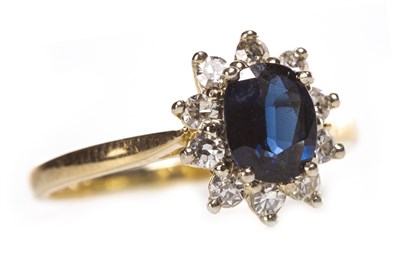 Lot 251 - A BLUE GEM AND DIAMOND CLUSTER RING