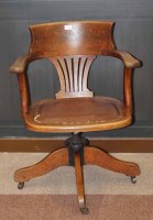 Lot 1221 - 20TH CENTURY OAK SWIVEL ELBOW CHAIR with...