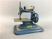 Lot 235 - A SET OF SCALES WITH CHILD'S HAND CRANK SEWING MACHINE