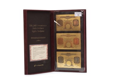 Lot 627 - A THE SINGAPORE MINT 23K GOLD REPLICA BANKNOTES