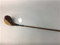 Lot 338 - A VINTAGE GOLF CLUB AND A WALKING STICK