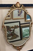Lot 355 - A SHIELD SHAPED WALL MIRROR AND ANOTHER WALL MIRROR