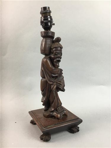Lot 379 - A CARVED FIGURAL LAMP AND OTHER ASIAN ITEMS
