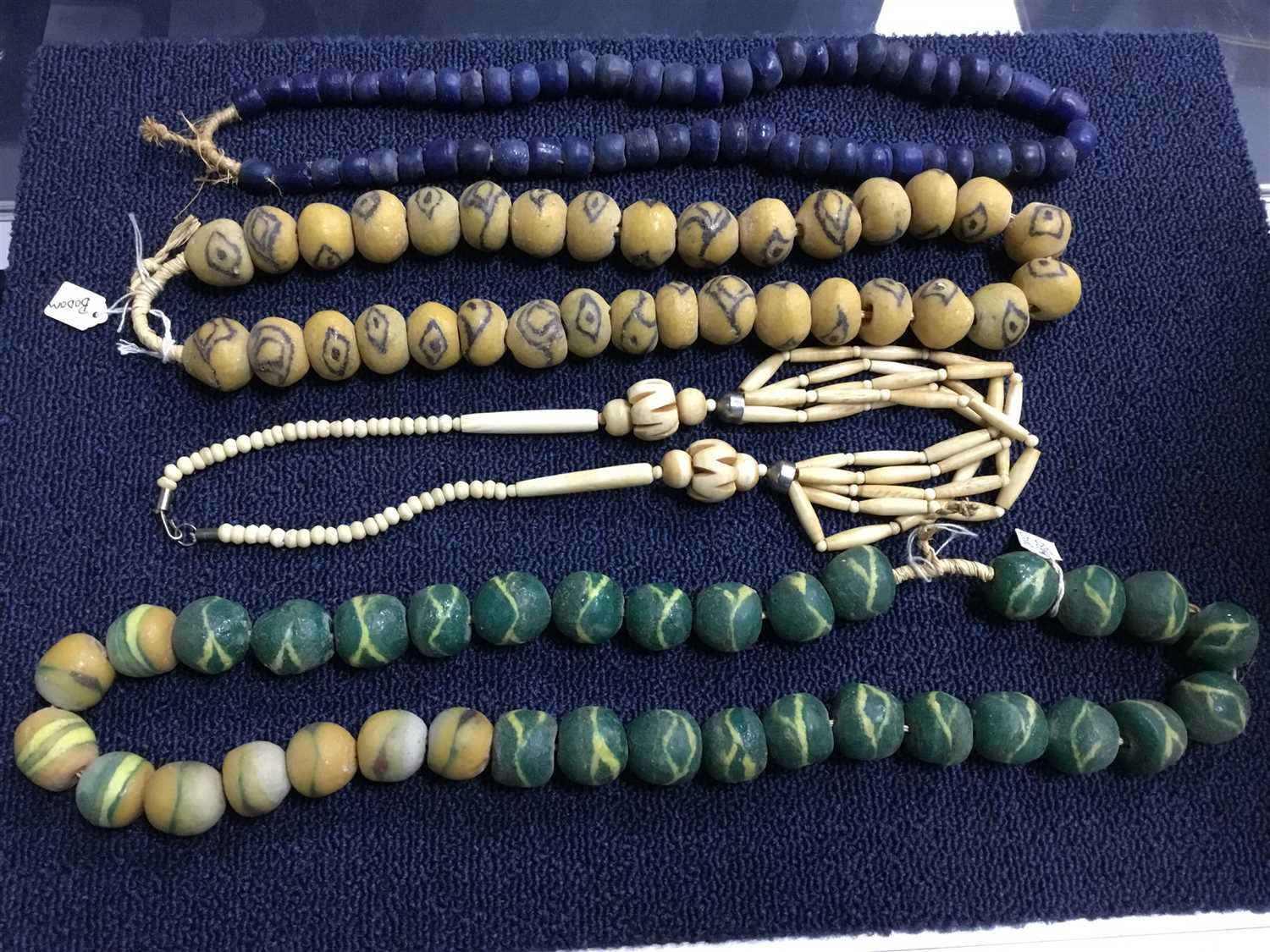 Lot 17 - A COLLECTION OF NIGERIAN GLASS BEAD NECKLACES AND OTHER NECKLACES