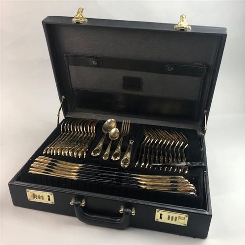 Lot 113 - A SUITE OF GILT HANDLED CUTLERY IN A FITTED CARRY CASE