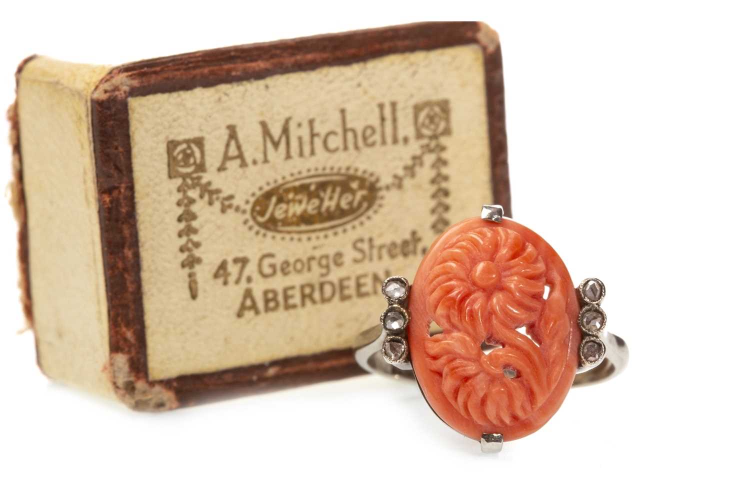 Lot 77 - AN EARLY 20TH CENTURY CORAL AND DIAMOND RING