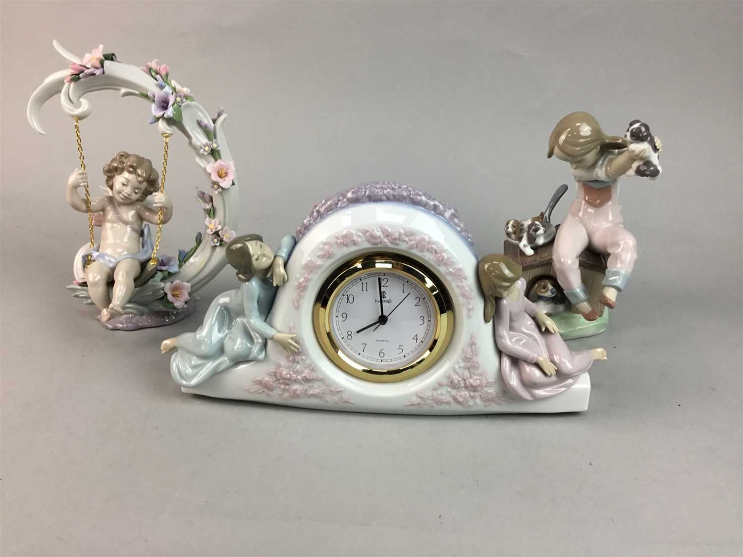 Lot 46 - A LLADRO CLOCK AND TWO LLADRO FIGURES