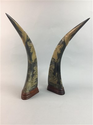 Lot 72 - A PAIR OF CARVED COW HORNS