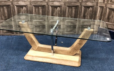 Lot 202 - A GLASS TOPPED COFFEE TABLE