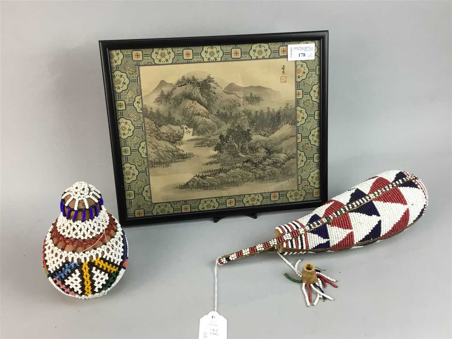 Lot 178 - TWO EARLY 20TH CENTURY BEADED GOURDS AND A PAINTING