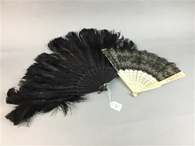 Lot 183 - AN OSTRICH FEATHER FAN AND A BONE AND LACE FAN