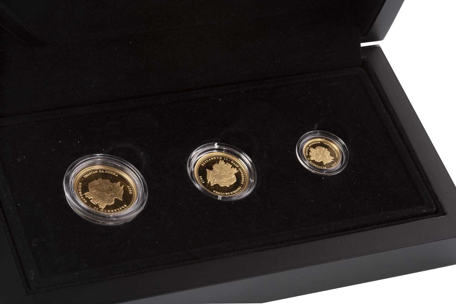 Lot 508 - A HATTONS OF LONDON THREE COIN SET