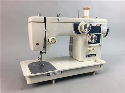 Lot 319 - A VINTAGE SEWING MACHINE, TWO PROJECTORS, FILM REELS AND A SCREEN