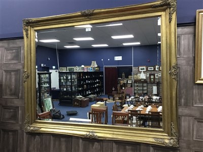 Lot 469 - AN OBLONG MIRROR IN REPRODUCTION GILT FRAME