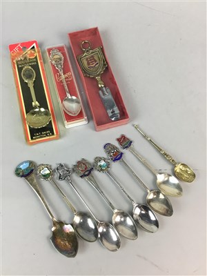 Lot 143 - AN EMBOSSED BRASS TRAY, SUGAR TONGS, POCKET KNIVES AND SOUVENIR SPOONS