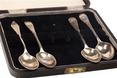 Lot 861 - A SET OF FOUR SILVER SAUCE LADLES ALONG WITH SILVER SPOONS