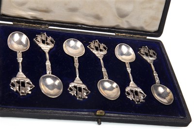 Lot 861 - A SET OF FOUR SILVER SAUCE LADLES ALONG WITH SILVER SPOONS