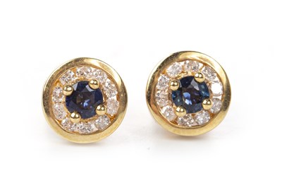 Lot 19 - A PAIR OF BLUE GEM AND DIAMOND EARRINGS