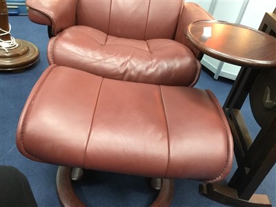 Lot 225 - A MODERN BURGUNDY LEATHER ARMCHAIR AND STOOL