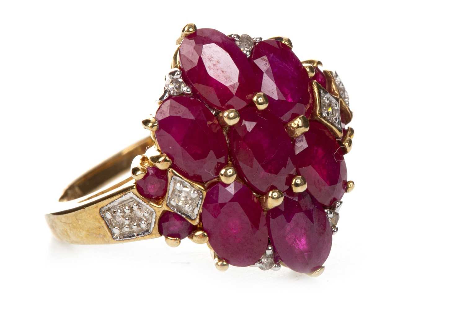 Lot 30 - RED GEM AND DIAMOND DRESS RING