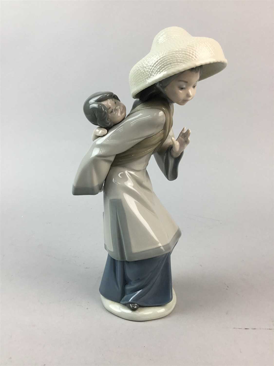 Lot 42 - A LLADRO FIGURE OF A CHINESE WOMAN AND A ROYAL DOULTON CHARACTER JUG