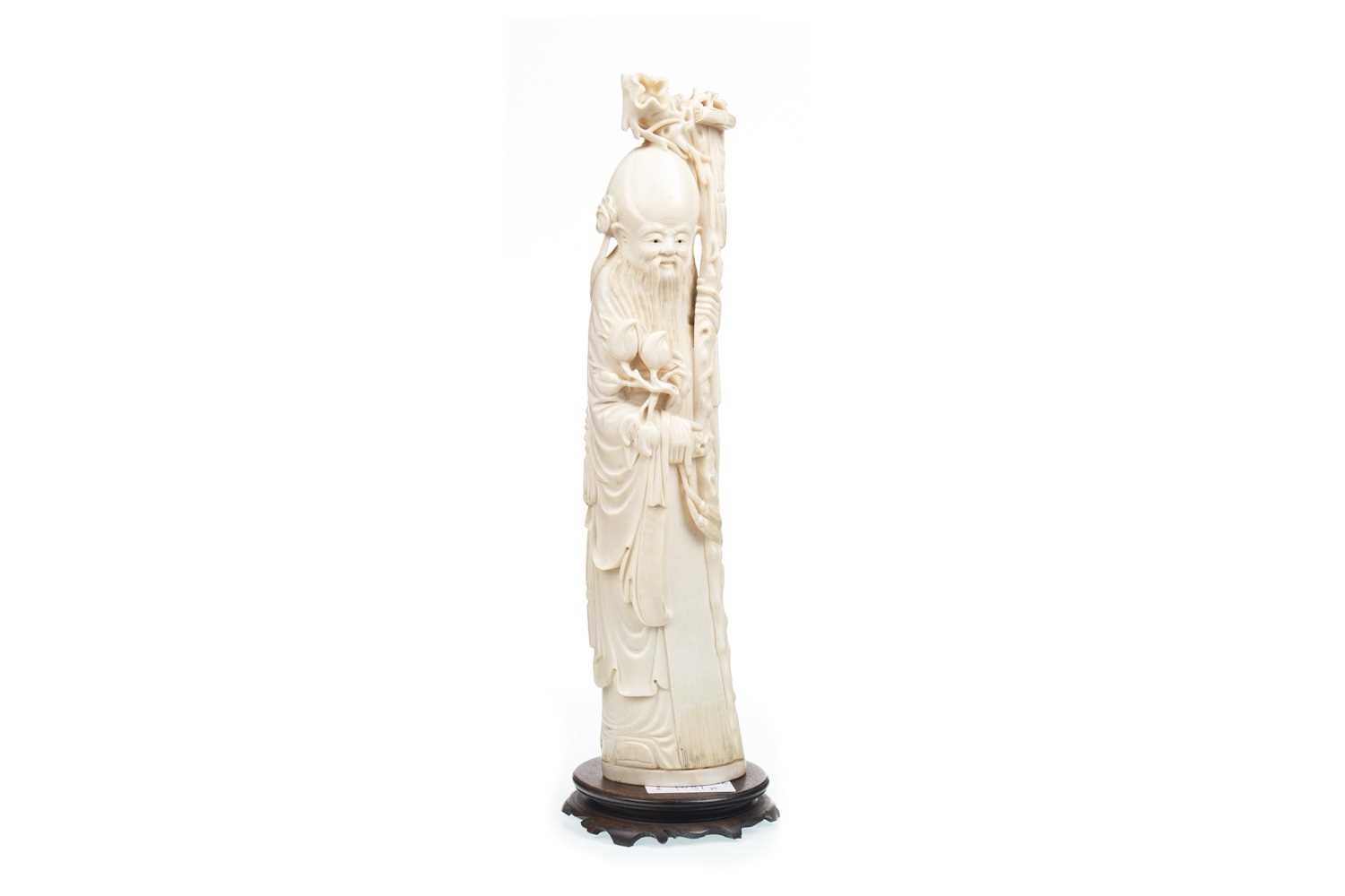 Lot 1091 - A LATE 19TH CENTURY CHINESE CARVED IVORY FIGURE OF SHOU LAO