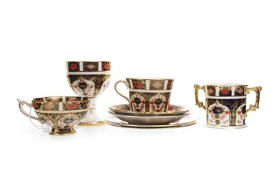 Lot 1234 - A LOT OF THREE ROYAL CROWN DERBY IMARI PATTERN CUPS AND SAUCERS ALONG WITH A CHALICE