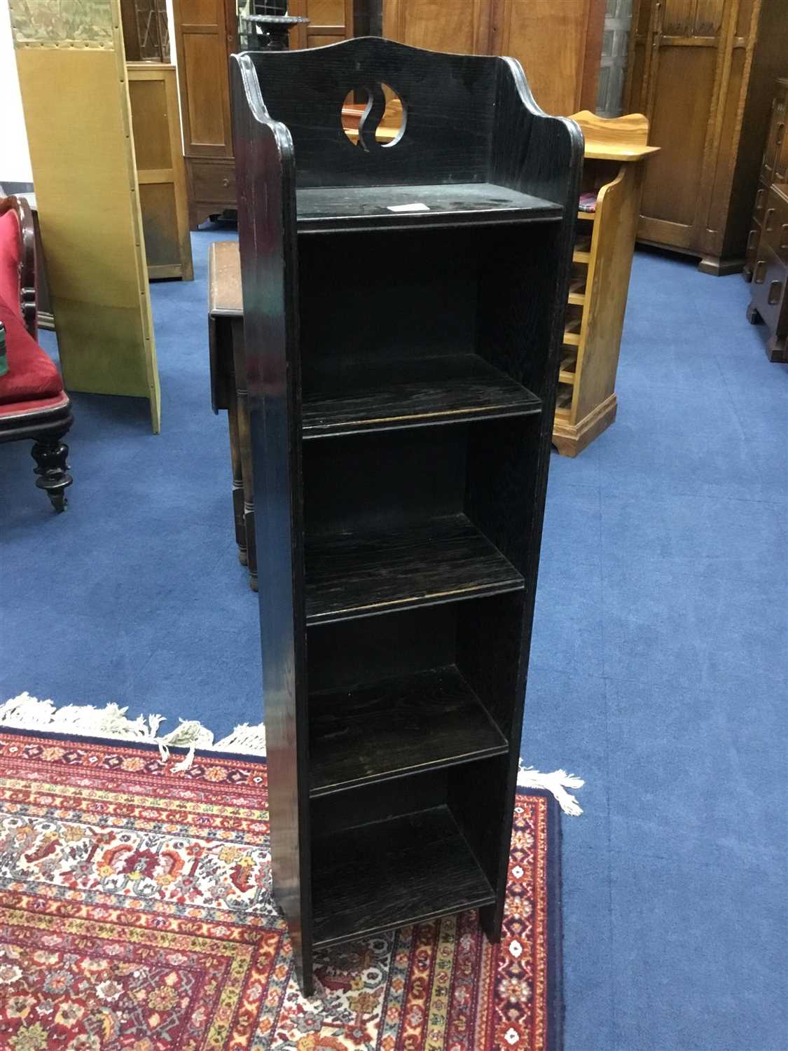 Lot 288 - A LIBERTY STYLE STAINED OAK OPEN BOOKCASE