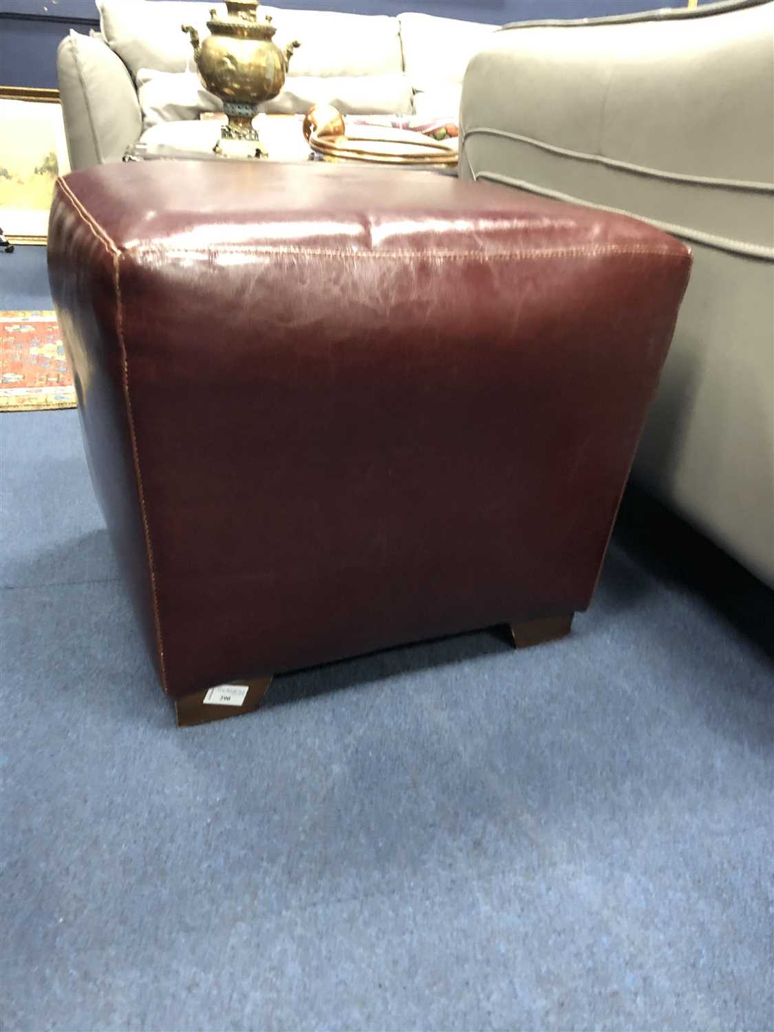 Lot 290 - A MODERN BROWN LEATHER STOOL