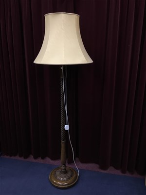Lot 329 - A STAINED WOOD STANDARD LAMP