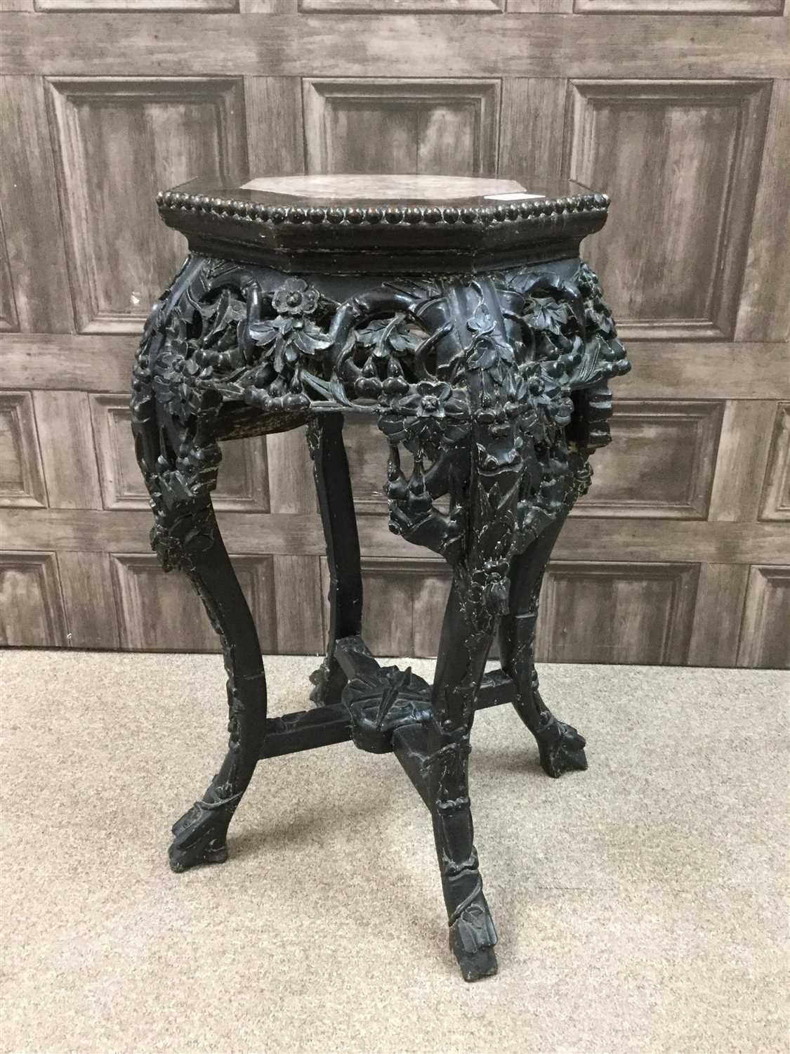 Lot 1006 - A 20TH CENTURY CHINESE HARDWOOD JARDINIERE STAND