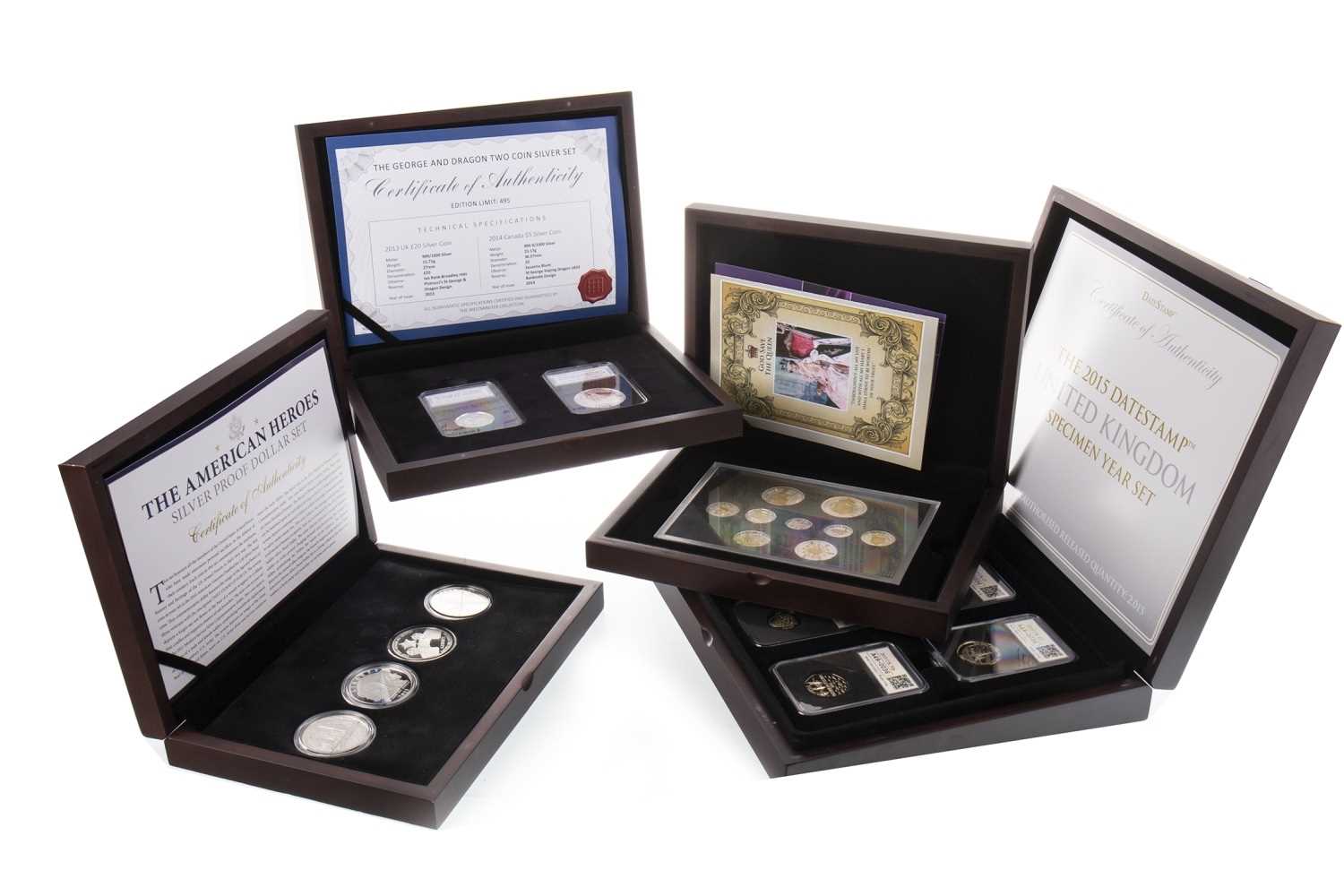 Lot 585 - TWO SILVER COIN SETS AND TWO OTHER COIN SETS