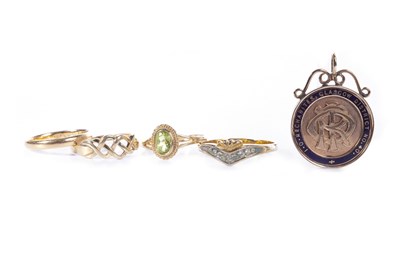 Lot 77 - THREE DRESS RINGS AND AN EARLY 20TH CENTURY MEDAL