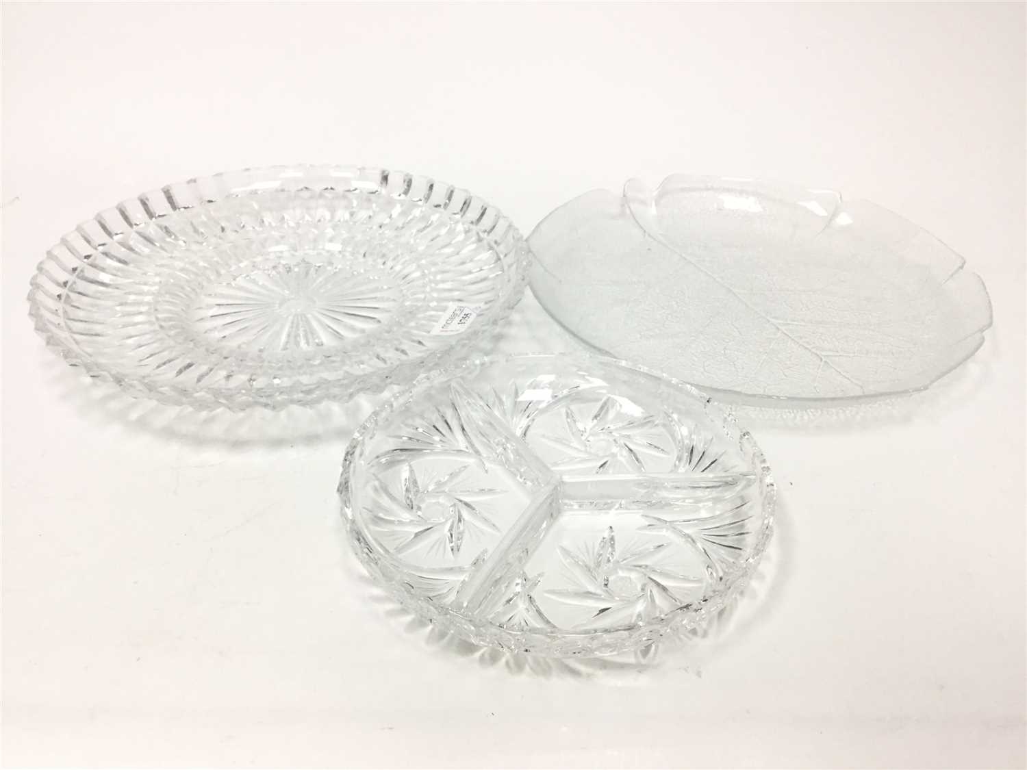 Lot 1755 - A SET OF FOUR GLASS CIRCULAR SERVING PLATES AND CRYSTAL DISHES