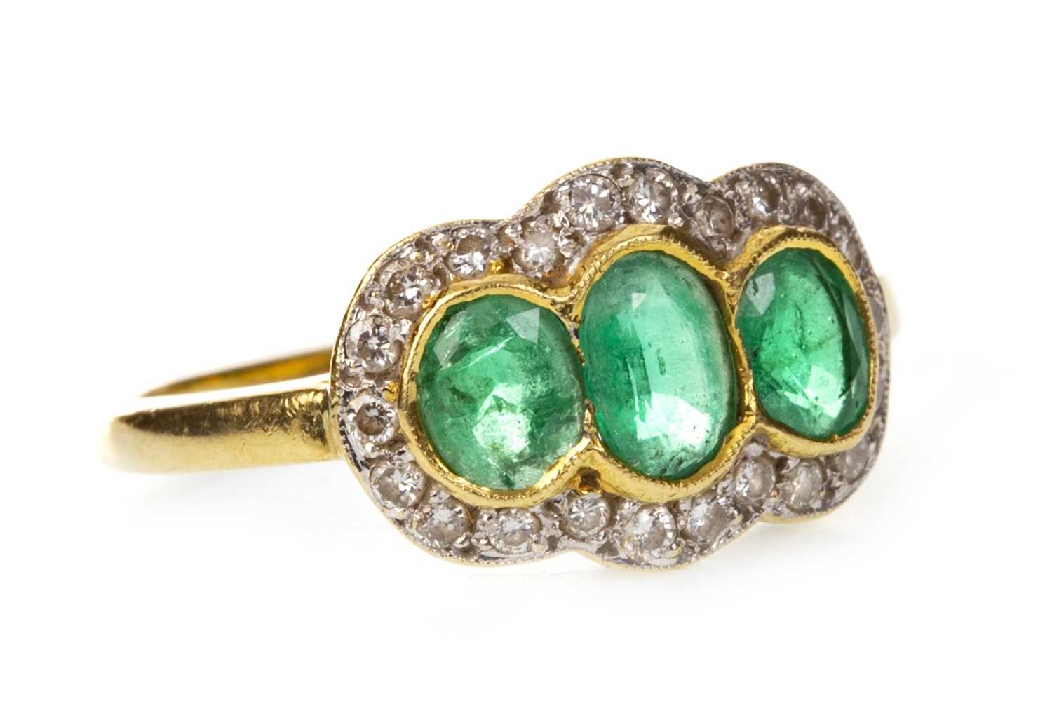 Lot 1 - A GREEN GEM AND DIAMOND RING