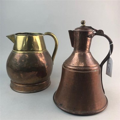 Lot 44 - A HAMMERED COPPER WATER JUG AND A COPPER AND BRASS JUG