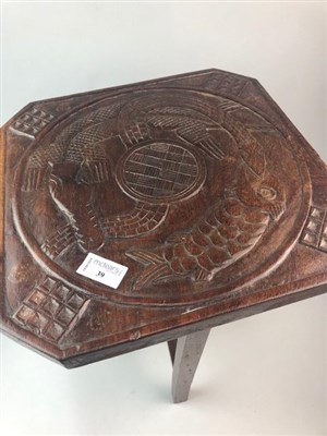 Lot 39 - A CARVED STAINED WOOD TABLE