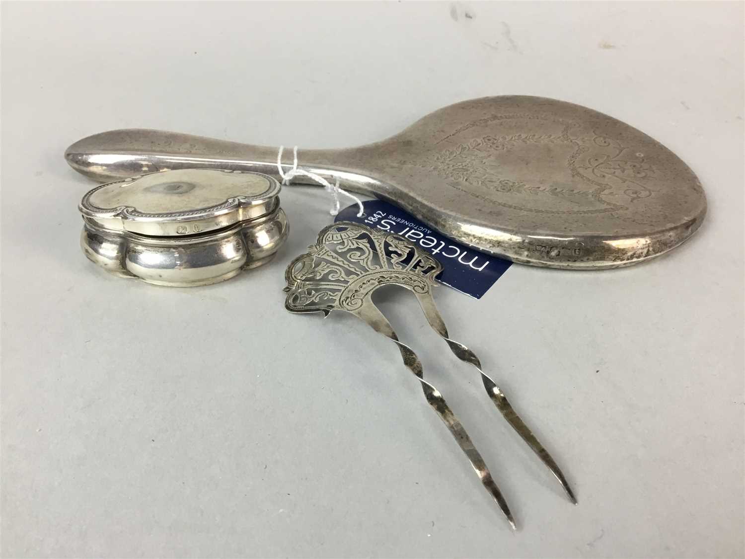 Lot 14 - A SILVER BACKED HAND MIRROR, PILL BOX AND A HAIR PIN