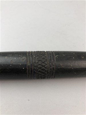 Lot 118 - AN UNUSUAL CARVED STONE BATON