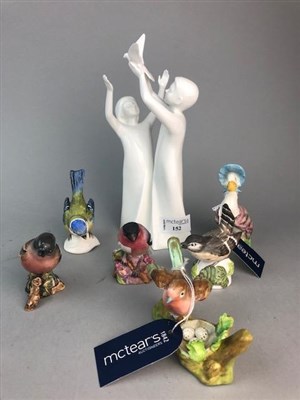 Lot 152 - A ROYAL DOULTON 'GIFT OF FREEDOM' FIGURE GROUP AND OTHER CERAMIC FIGURES