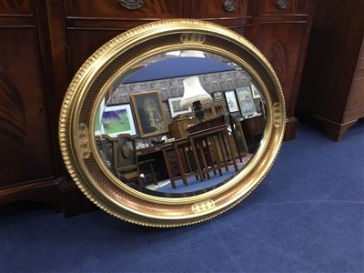 Lot 309 - A GILT FRAMED OVAL WALL MIRROR AND ANOTHER WALL MIRROR