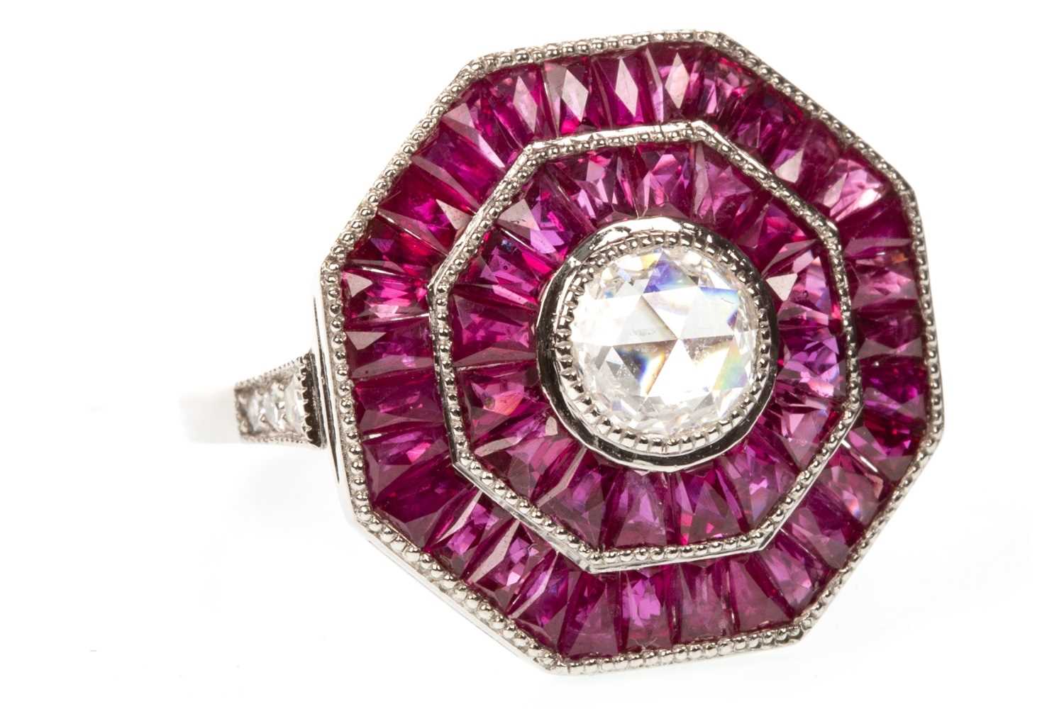 Lot 169 - A RUBY AND DIAMOND TARGET RING