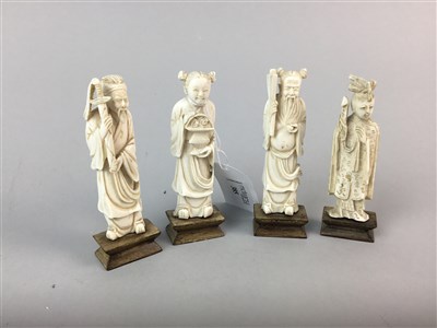 Lot 385 - A LOT OF FOUR EARLY 20TH CENTURY IVORY FIGURES