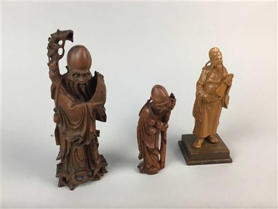 Lot 390 - A LOT OF THREE CHINESE CARVED HARDWOOD FIGURES