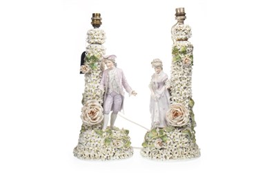 Lot 1262 - A PAIR OF VICTORIAN CERAMIC FIGURAL LAMP BASES