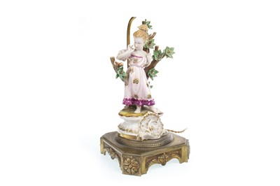 Lot 85 - A VICTORIAN FIGURAL AND ORMOLU LAMP BASE