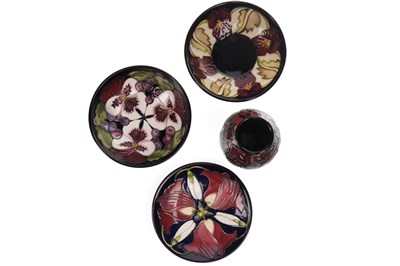 Lot 1287 - A MOORCROFT 'NIGHT ROSE' VASE, A PLATE AND TWO BOWLS