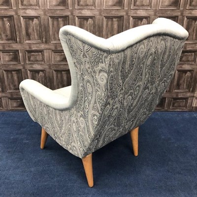 Lot 199 - A PAIR OF MODERN WING BACK ARMCHAIRS