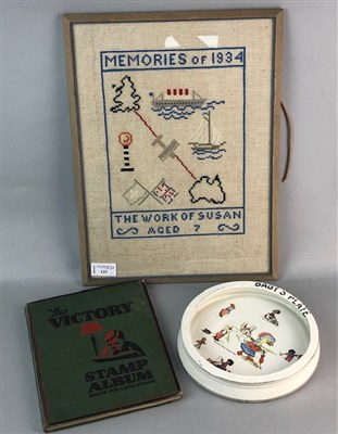 Lot 97 - A RETRO BABY'S PLATE, A SAMPLER AND A STAMP ALBUM
